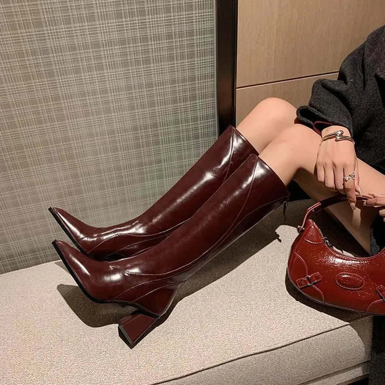 Women's black retro high heel riding boots with lace-up front and waterproof platform sole