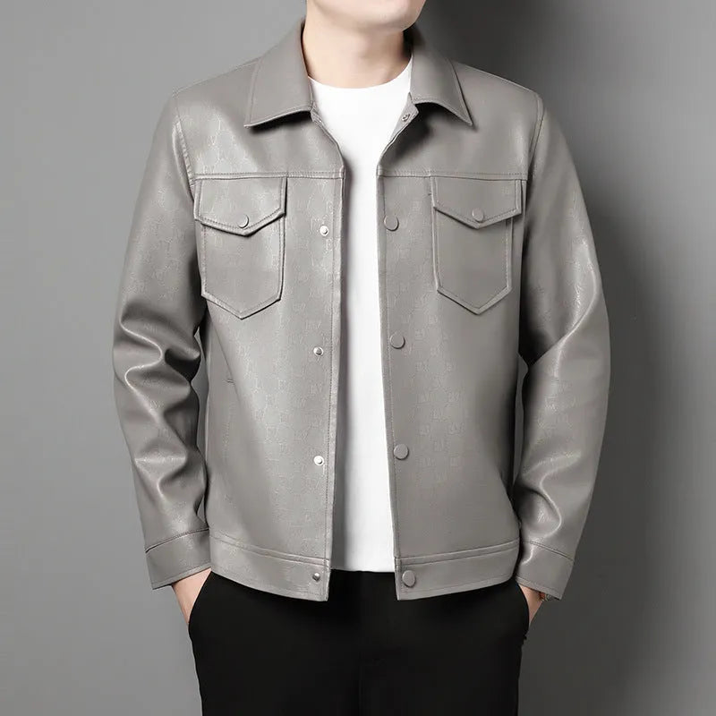 Men's slim fit printed synthetic leather jacket with lapel collar, straight hem, and top stitch patch pocket in black or light grey