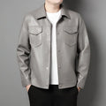 Men's slim fit printed synthetic leather jacket with lapel collar, straight hem, and top stitch patch pocket in black or light grey