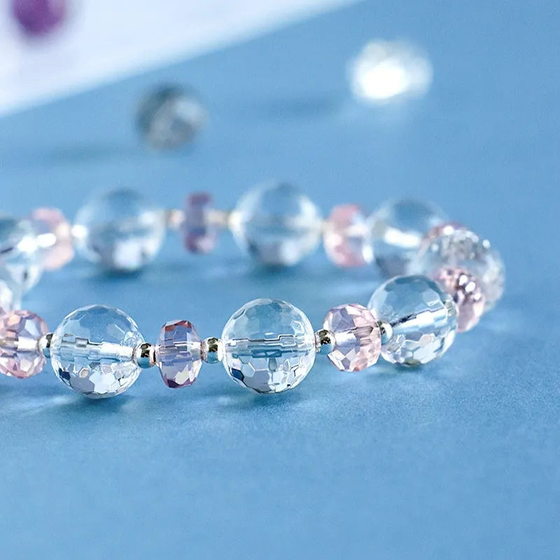 White crystal XINGX bracelet with lucky cat charm and diamond-shaped crystals in Korean style design