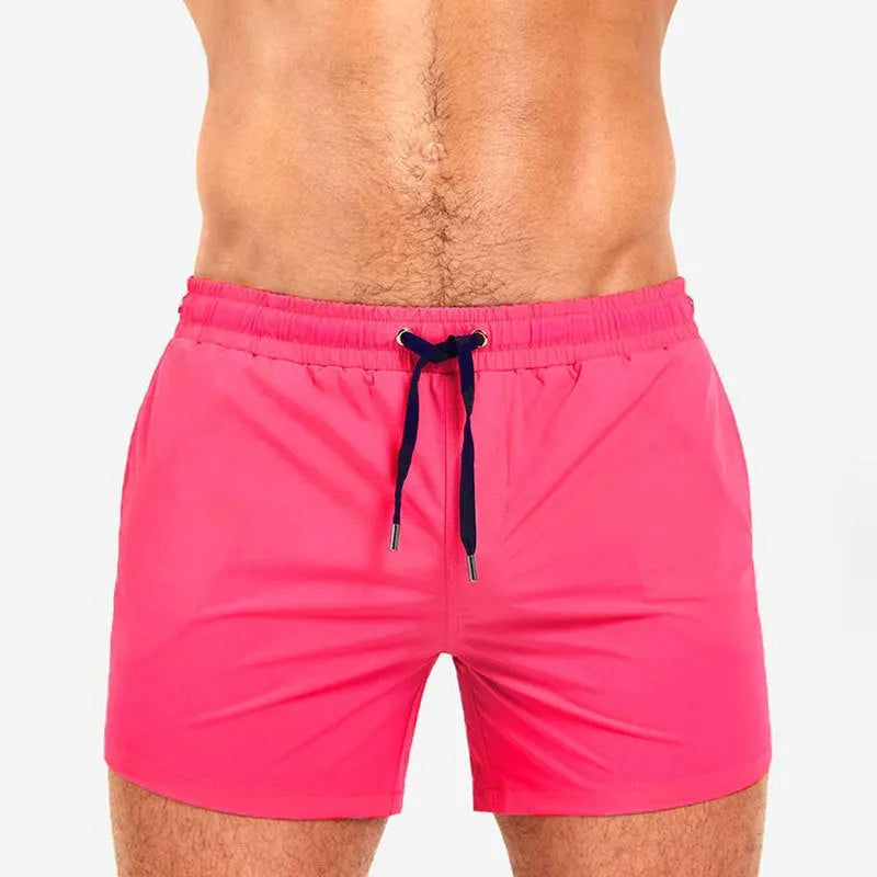Men's mesh lining sports shorts in polyester available in multiple colours