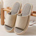 Women's open toe linen slippers in light brown, showing thickened sole and breathable design.
