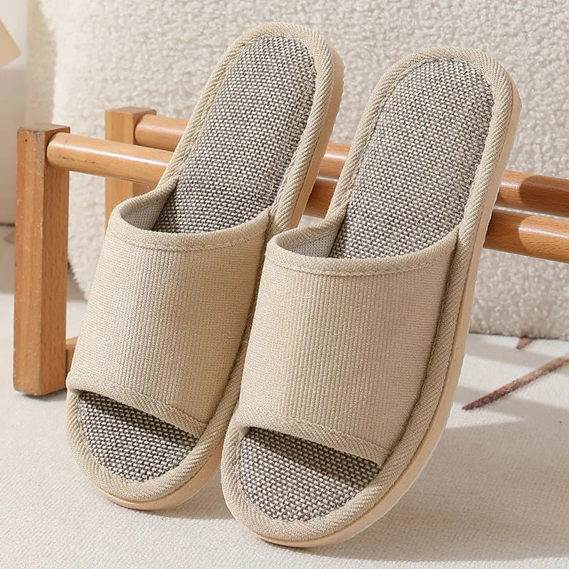 Women's open toe linen slippers in light brown, showing thickened sole and breathable design.
