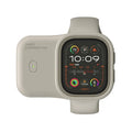 Apple Watch portable charging case with silicone cover, shown in Brown, Midnight Blue, and Starlight colours.