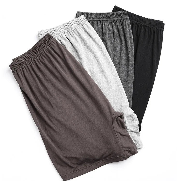 Men's solid colour modal boxer shorts with high waist, shown in black, blue, grey and brown.