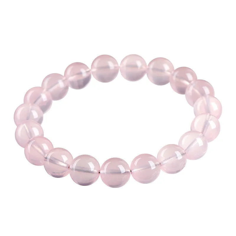 Crystal bracelet with polished pink round beads in natural starlight design showing single circle construction
