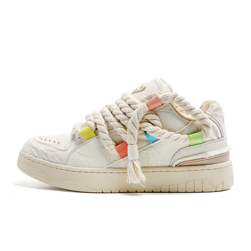 Creamy white retro skateboard shoes with lace-up front and low platform heel