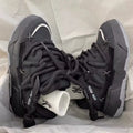 Women's grey retro chunky sneakers with thick rubber platform sole and front lace-up closure