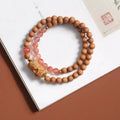 Brown wooden bracelet with South Red Zachilam double circle design in traditional Chinese style