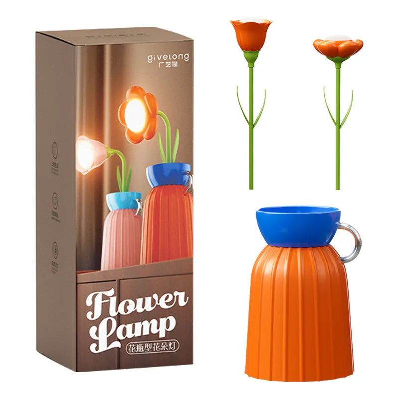 LED flower lamp in pink rose style with USB cable, 30cm tall, on a bedroom table