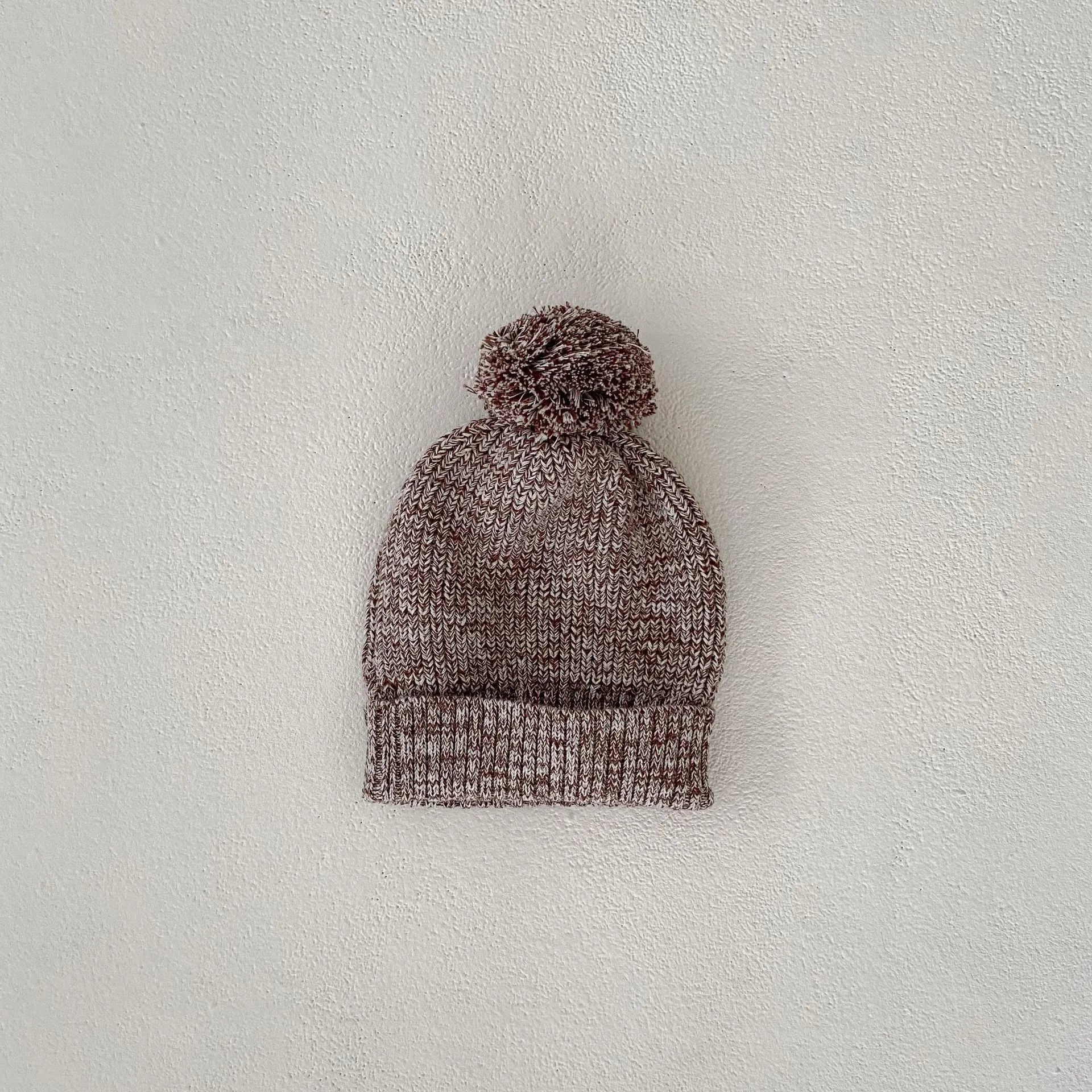 Infant girl dark brown knitted three-piece set with fur ball hat on hanger