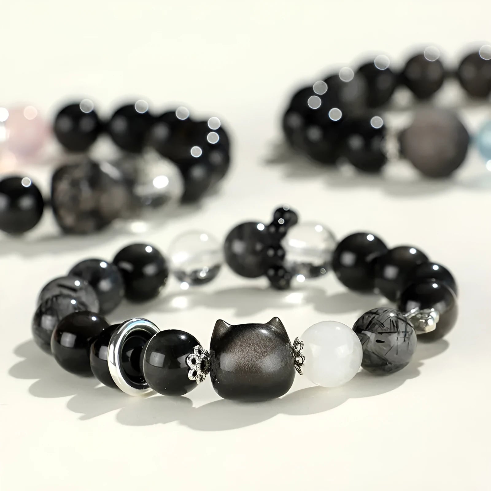 Silverstone and crystal beaded bracelet with electroplated finish and adjustable extension chain