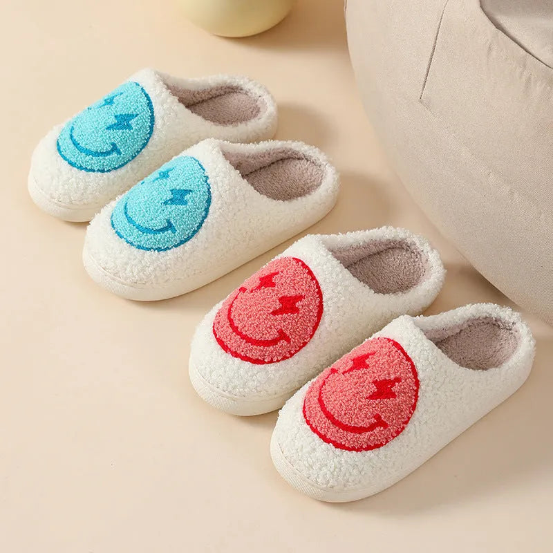 Women's plush cartoon-style home slippers with a round toe and PVC sole.