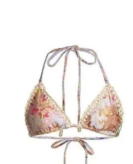 Women's creamy-white floral bikini set with matching skirt bottom