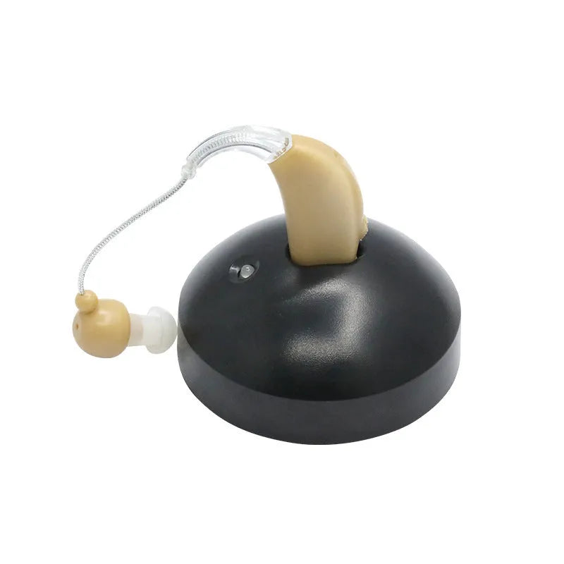 Black rechargeable hearing aid amplifier with silicone ear tips for elderly hearing support