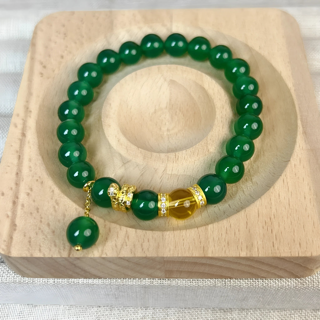 Handmade green chalcedony and red agate beaded bracelet with copper geometric design