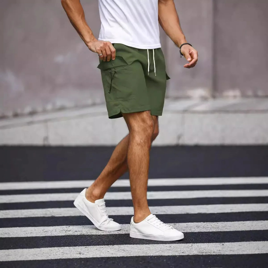 Men's loose fit workwear shorts in army green colour with straight leg cut and micro-elastic fabric