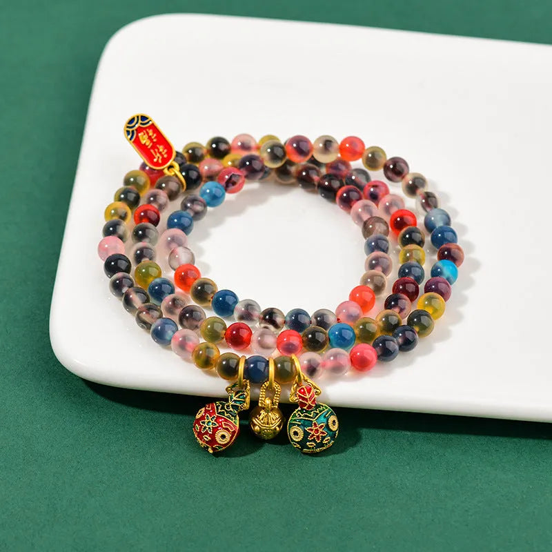 Dzogchen agate bracelet with gray glaze and gold beast decorative elements