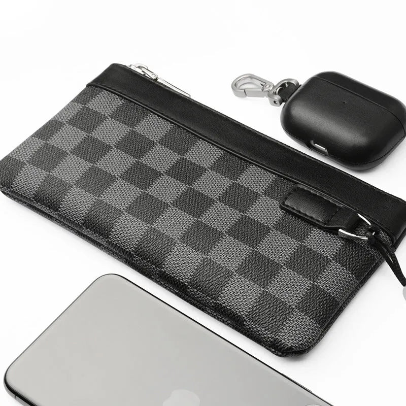 Black genuine cowhide leather men's clutch wallet showing its 20x10 cm size.