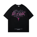 Men's black cotton t-shirt with printed design showing loose fit and short sleeves