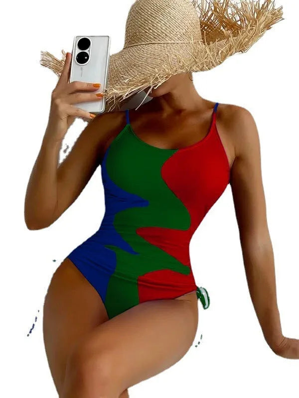 Women's sleeveless one-piece swimsuit in a choice of blue, purple, brown, or green colours.