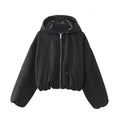 Women's suede hooded jacket in white and black colours showing casual styling