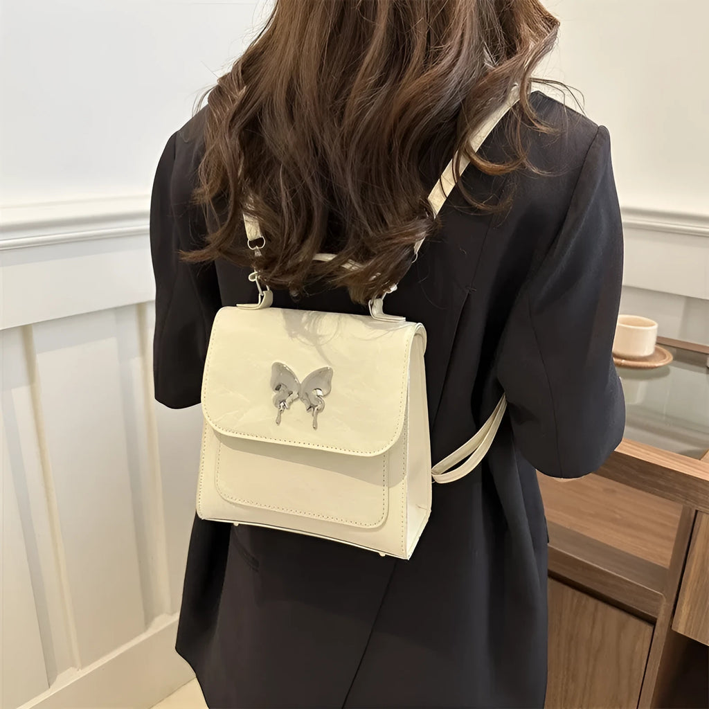 Preppy style women's backpack handbag in PU leather with bow detailing and six colour options