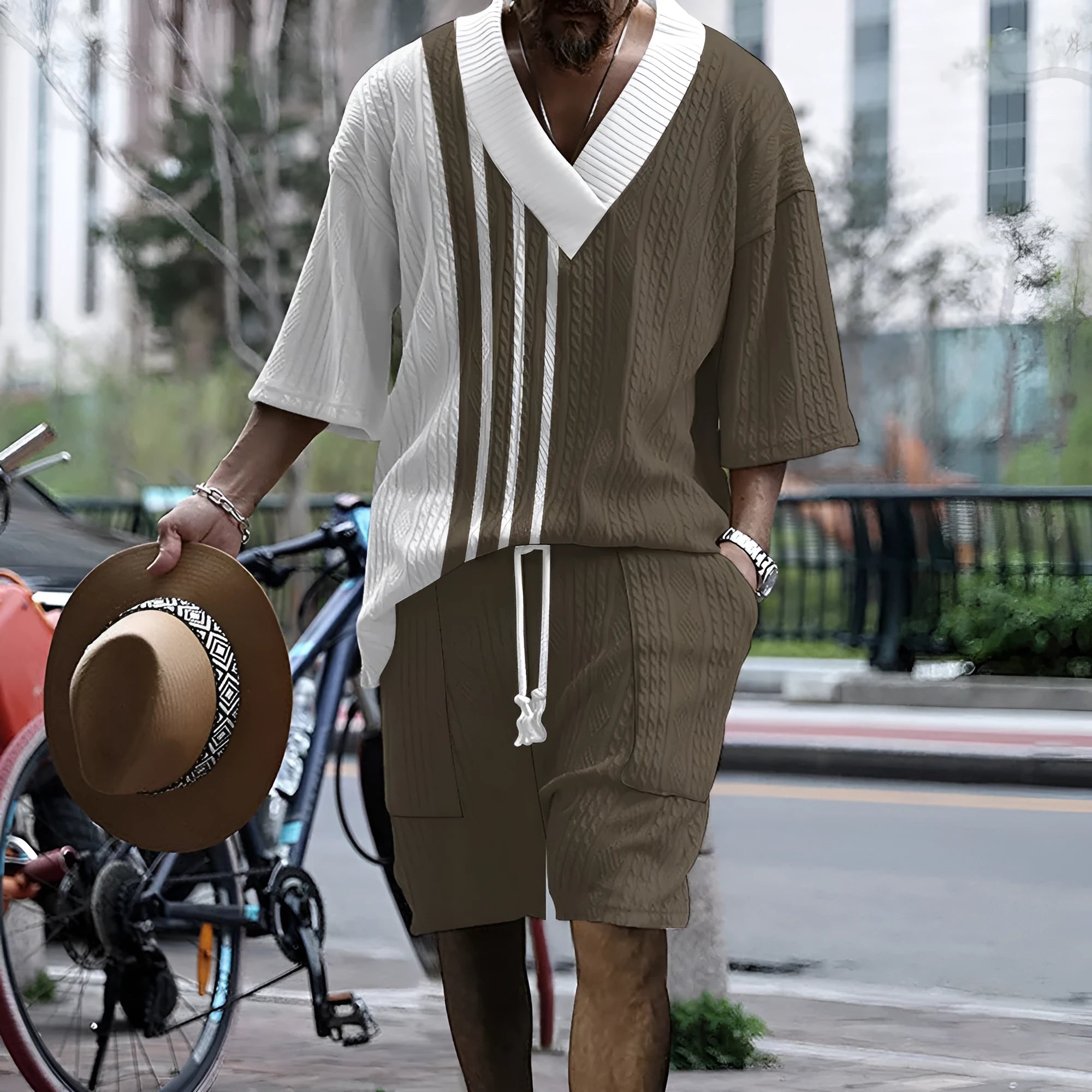 Men's grey printed drop-shoulder knitted short-sleeve top with matching shorts, a casual tracksuit set.