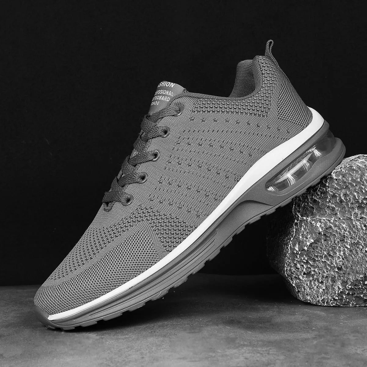 Casual Flyknit running shoes in a colour option, showing mesh upper and round toe design.