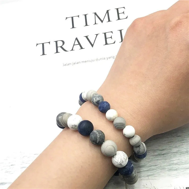Universe Wind planet stone bracelet showing 10mm natural stone bead on adjustable hand-tied cord