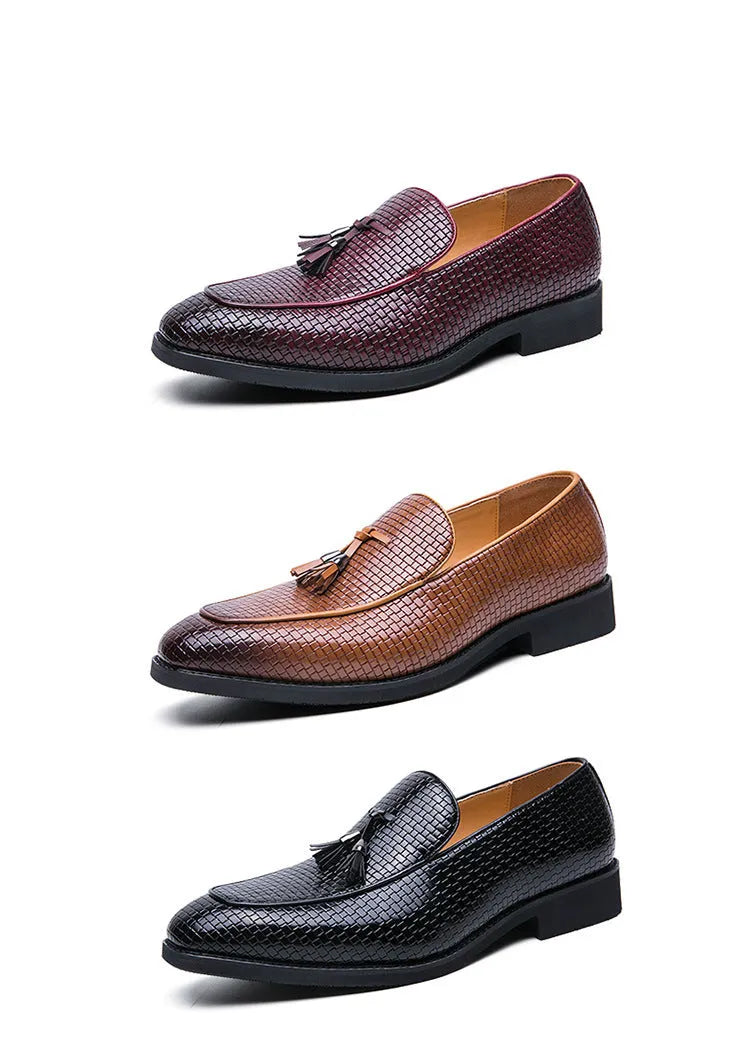 Men's black formal slip-on shoe with pointed toe and decorative tassel on artificial PU upper.