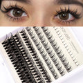 False eyelash glue kit with segmented artificial fibre lashes, pink and black adhesives, tweezers and brush applicators