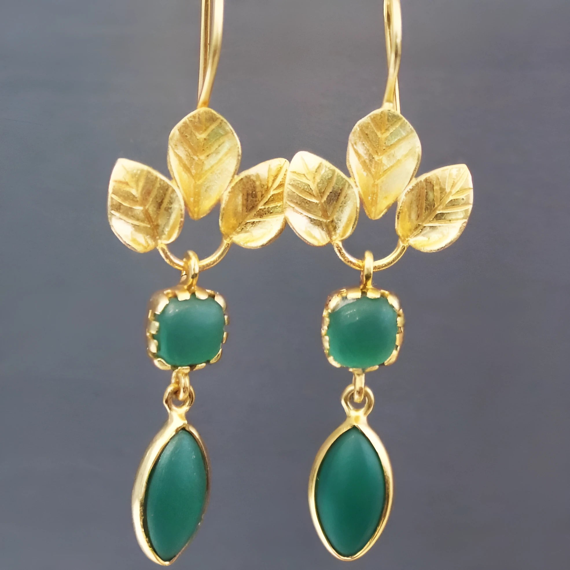 Gold-coloured vintage copper drop earrings with French leaves, tassels, and zircon stone details.