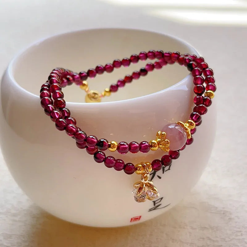 Natural garnet women's bracelet with double ring design and genuine stones