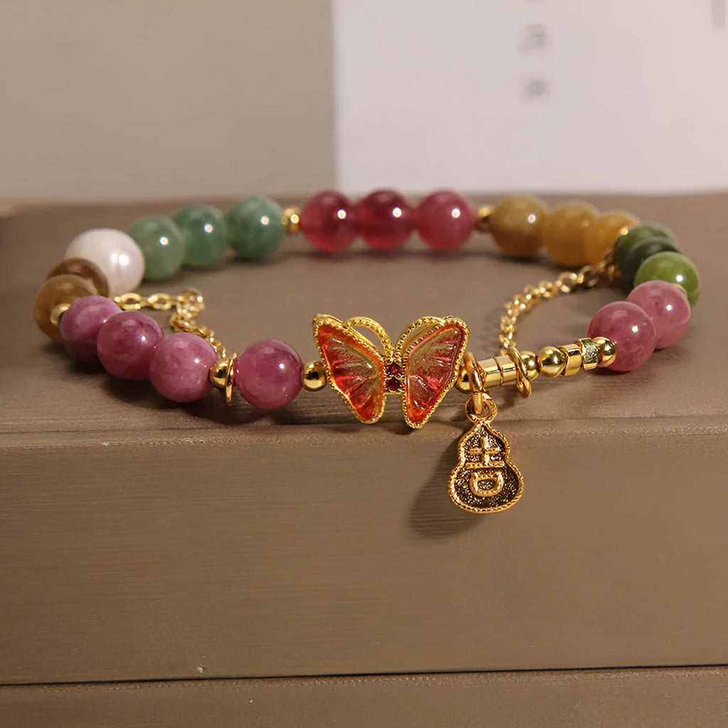 Natural jade coloured agate bracelet with butterfly-gourd tourmaline detail for women.