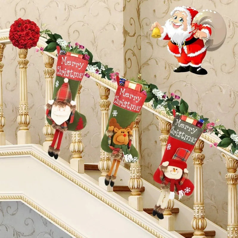 Three large Christmas stockings with 3D Santa, snowman, and reindeer designs hung on tree