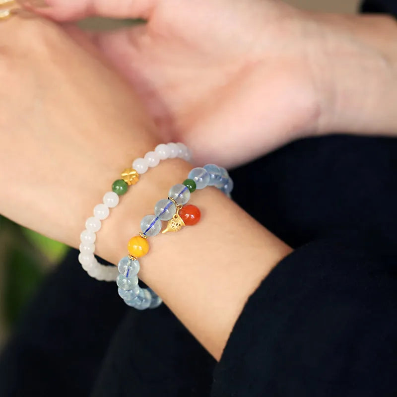 Iced aquamarine crystal bracelet with 8mm geometric beads and ethnic retro styling