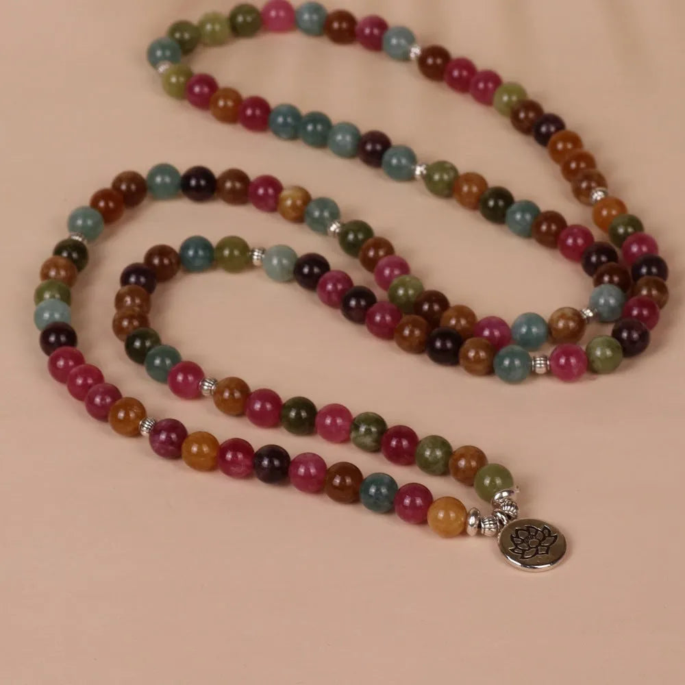 108 bead lotus multi-layer bracelet with tourmaline colour alloy construction and hanging charm