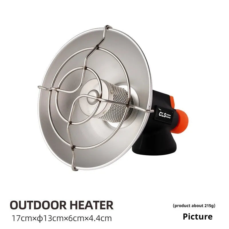 Black and orange portable outdoor gas heating stove with automatic ignition on a camping table.