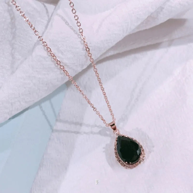 Geometric rhinestone water drop necklace in rose gold electroplated finish
