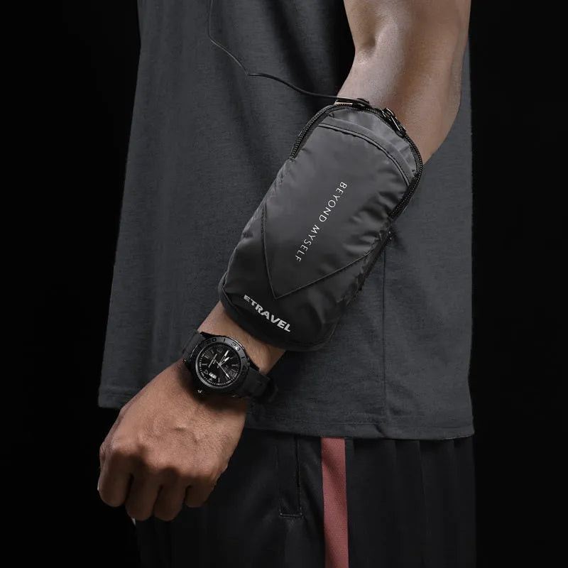Lightweight reflective running arm bag in black, showing the strap and 7-inch capacity pocket.