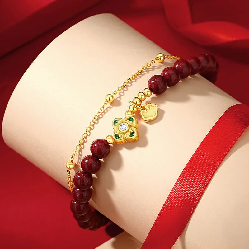 Sterling silver women's bracelet with geometric design featuring Ruyi, Xiangyun motifs and cinnabar flower detail.