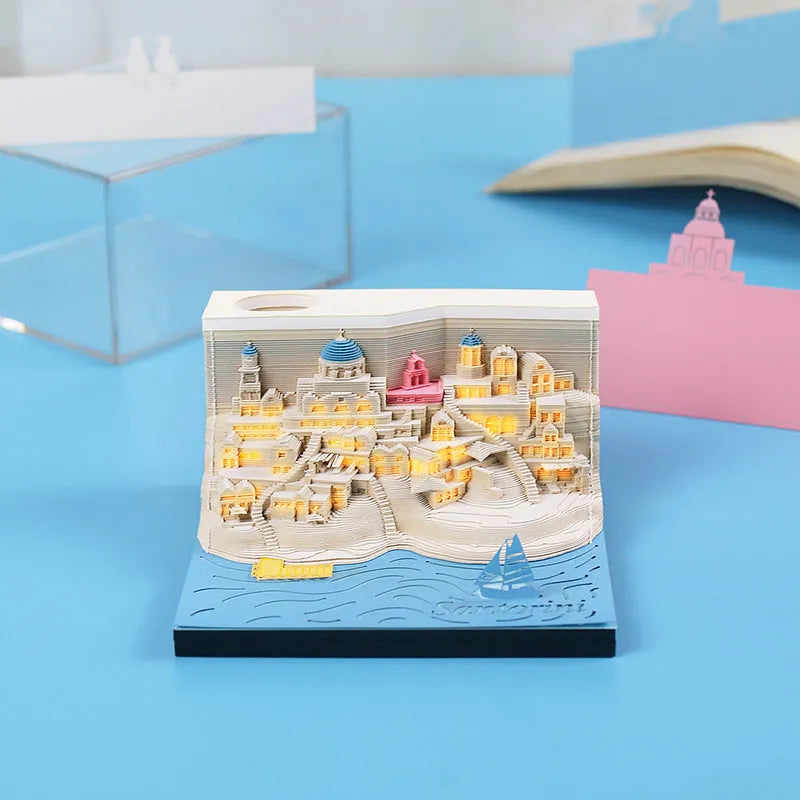 Santoorini 3D paper carving notepad model with LED lights, showing layered beach construction.