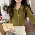 Women's loose fit long-sleeved knitted cardigan in viscose fibre, shown in beige colour