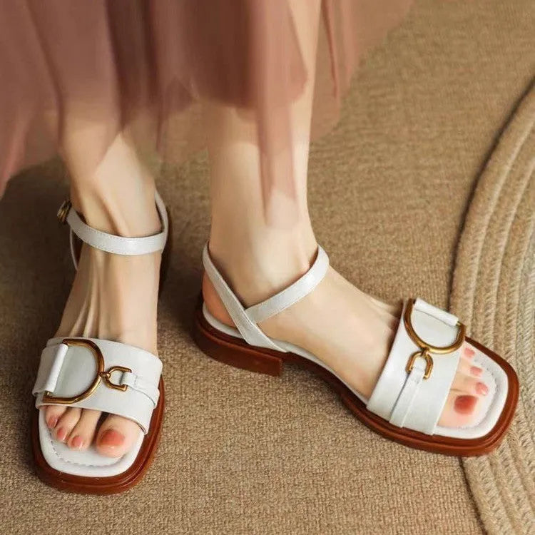 Women's casual leather sandals with thick rubber soles and button fastening in beige colour