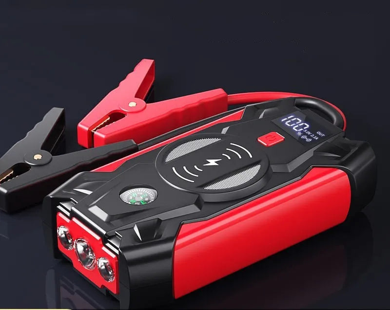 Red car jump starter power pack with digital display and thick battery clips