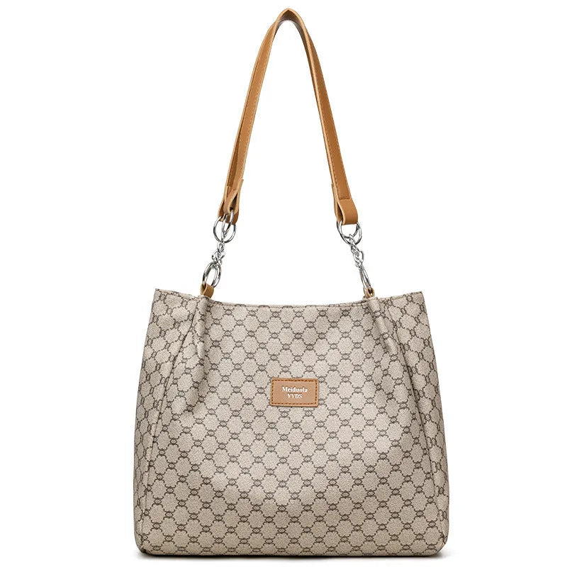 Women's retro fashion handbag in soft brown PU leather with shoulder strap.