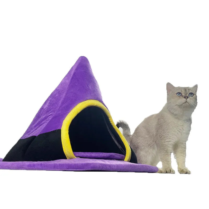 Purple cloth Halloween witch hat shaped cat bed for small cats.