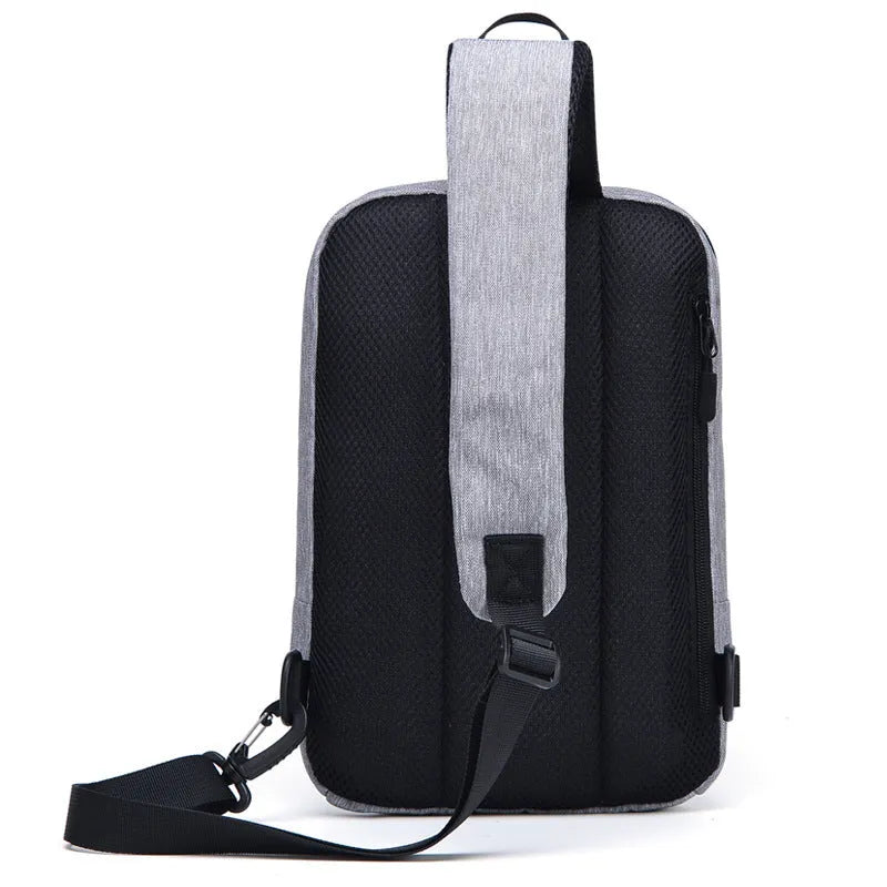 Trendy men's chest bag in polyester embossed finish with zipper and soft handle, 22x9x34cm size
