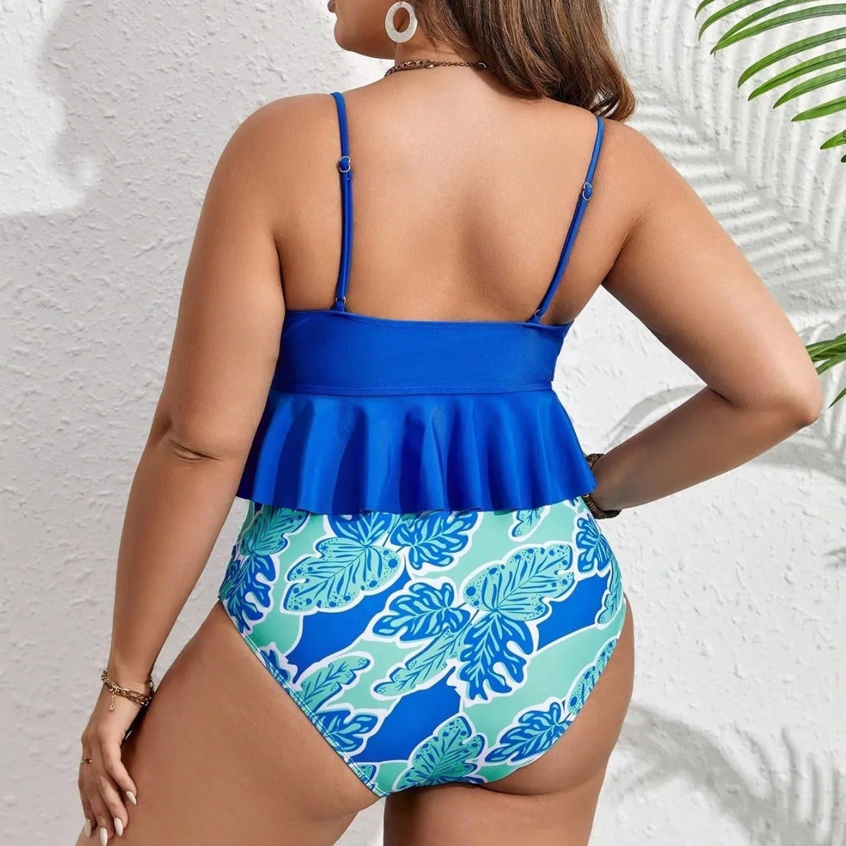 Blue plus size two-piece bikini swimsuit for women on a mannequin.
